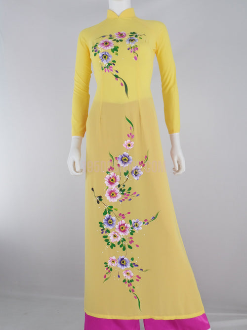 Áo dài  vàng tầm ý vẽ hoa